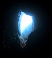 blue light bulb inside a underwater cave