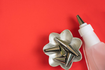 pastry bag and nozzles on the kitchen on the table, pastry set
