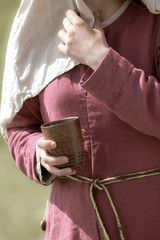 Girl with clay jugs.