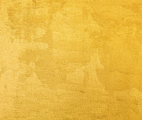 Abstract gold color painted on rough surface
