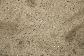 Sand surface on the street. Dust and dirty on the floor. Asphalt ground texture. Tiny rocks. 