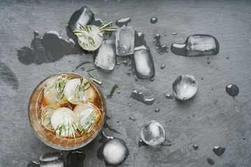 Misted glass of whiskey on the rocks