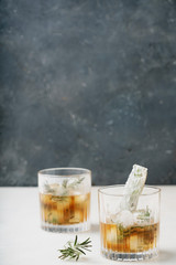 Misted glass of whiskey on the rocks