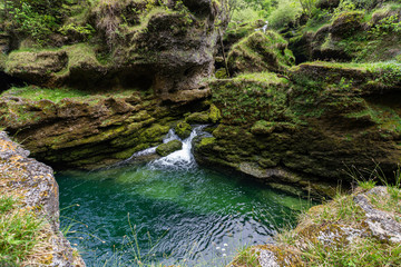 The Traunfall - between trees and rocks there is a tropical waterfall in Upper Austria.
