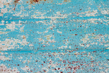 peeling paint on metal close-up with copy space. Rough texture with peeling paint. 