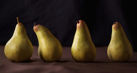 pears on black background fresh food 