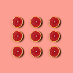 Grapefruit on pink background. Healthy eating.