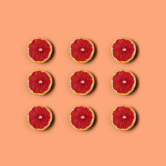 Grapefruit on orange background. Healthy eating.