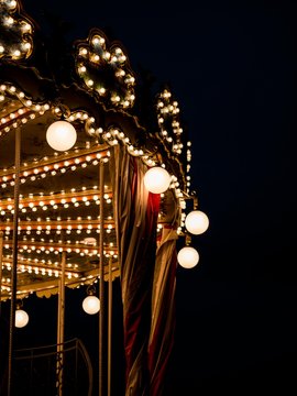 Enchanted Night: A Carousel of Lights in the Darkness