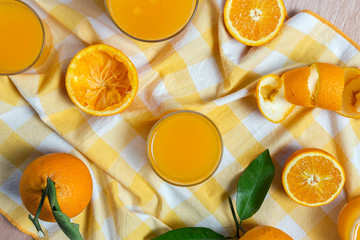 Homemade orange juice from above on wooden table