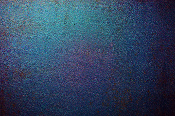 Brutal metal texture for a dark rough background. Some rainbow stains and rust