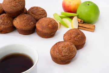Apple Cinnamon Muffins with apples and cinnamon sticks