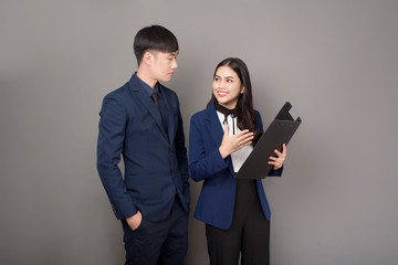 portrait of businessman and professional consultant business woman in studio