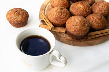 Apple Cinnamon Muffins with apples and cinnamon sticks