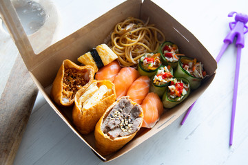 Sushi box with nigiris and tofu bags 
