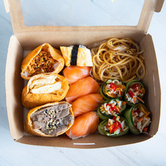 Sushi box with nigiris and tofu bags 
