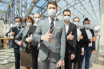 Successful business people wearing masks