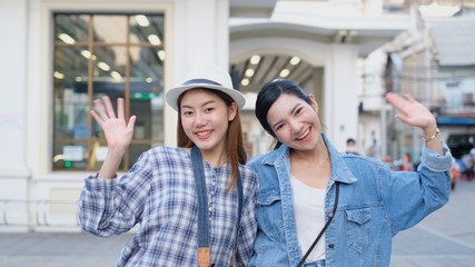 Traveler Asian blogger women travel in Bangkok, Thailand, beautiful female using mobile phone make vlog and live in social media .woman tourist making video call with smartphone .