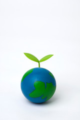 sprout on globe with white background