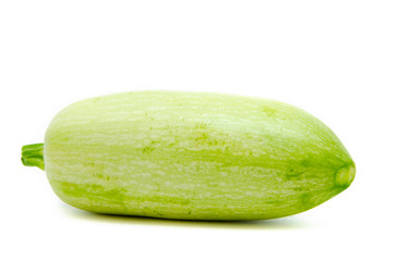 Young light green zucchini, organic natural on a white background. Squash sideways,  top