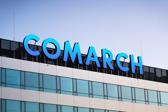 KRAKOW, POLAND - May 11, 2019 Comarch Business City of Krakow on the Jana Pawła II street, district modern buildings including the company logo of including the company Comarch.