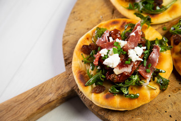 Mini Pizza with spanish ham in italy