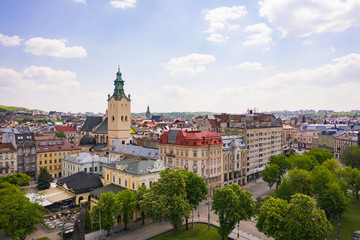 Fototapeta premium Aerial view on Jesuit Church, City Hall and Latin Cathedral in Lviv, Ukraine from drone