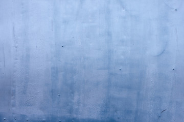 Metal surface painted with blue paint. Texture for design, material for 3D modeling.