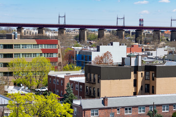 Astoria Queens New York Neighborhood Skyline with Residential Buildings and the Hell Gate Railroad...