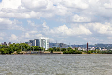 Guaiba shore with trees and buildings