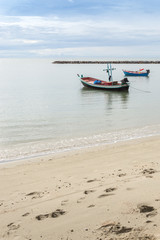 Fototapeta premium Small fishing boat mooring at the beach.
