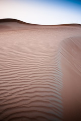 Desert sand dunes at dusk