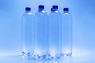 Group of plastic bottles.