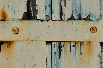 closeup details of chipped paint on wood