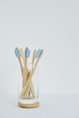 Bamboo toothbrush on the light background