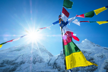 View of Mount Everest and Nuptse with buddhist prayer flags from Everest Base Camp