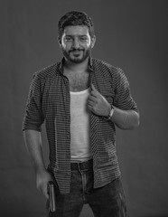 weapons in the hands of one gangster men,look at the angry camera,mafia consept