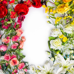 Top view of round frame with decoration artificial flowers, branches, leaves, petals, instruments and paint. isolated on white background. 
