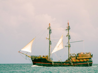 pirate ship on the water sailing with tourist