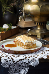 Slice of layered honey cake russian Medovik