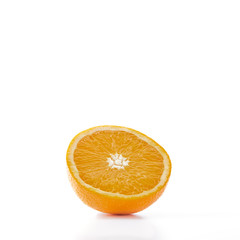 slices of ripe orange fruits on white