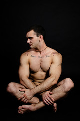 Naklejka premium Young muscular man. Recreation and sports. 