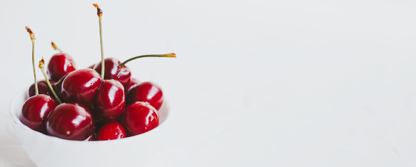 Fresh cherries. Cherry on white background. Healthy food concept.