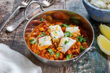Curried cod with chickpeas, fresh coriander and rice