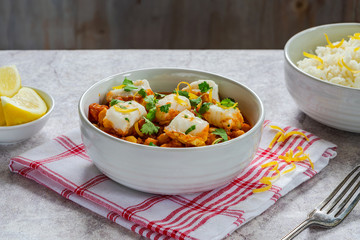 Curried cod with chickpeas, fresh coriander and rice
