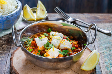 Curried cod with chickpeas, fresh coriander and rice