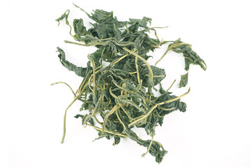Dried mulberry leaves are isolated on a white background