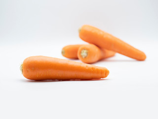 Carrot from market on white background. It is an ingredient for many kind of food savory, dessert, beverage. Salad, soup, cake, smoothie and many dish that can made by carrot and good for health.