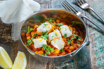Curried cod with chickpeas and fresh coriander