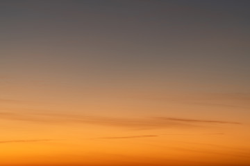 Fototapeta premium Sky gradient from blue to orange sunset